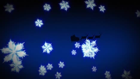 Animation-of-santa-claus-in-sleigh-with-reindeer-passing-over-snowflakes-falling