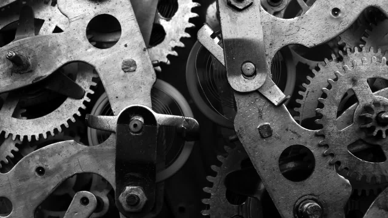 Watch mechanism macro loop. Old vintage clock mechanism working, closeup shot with soft focus. Close up of a internal clock mechanism. Vintage Watch Gears Movement Macro.