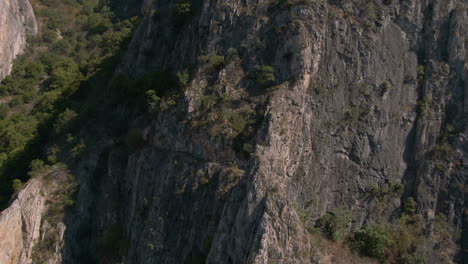 drone shot of cliff in matka canyon in macedonia