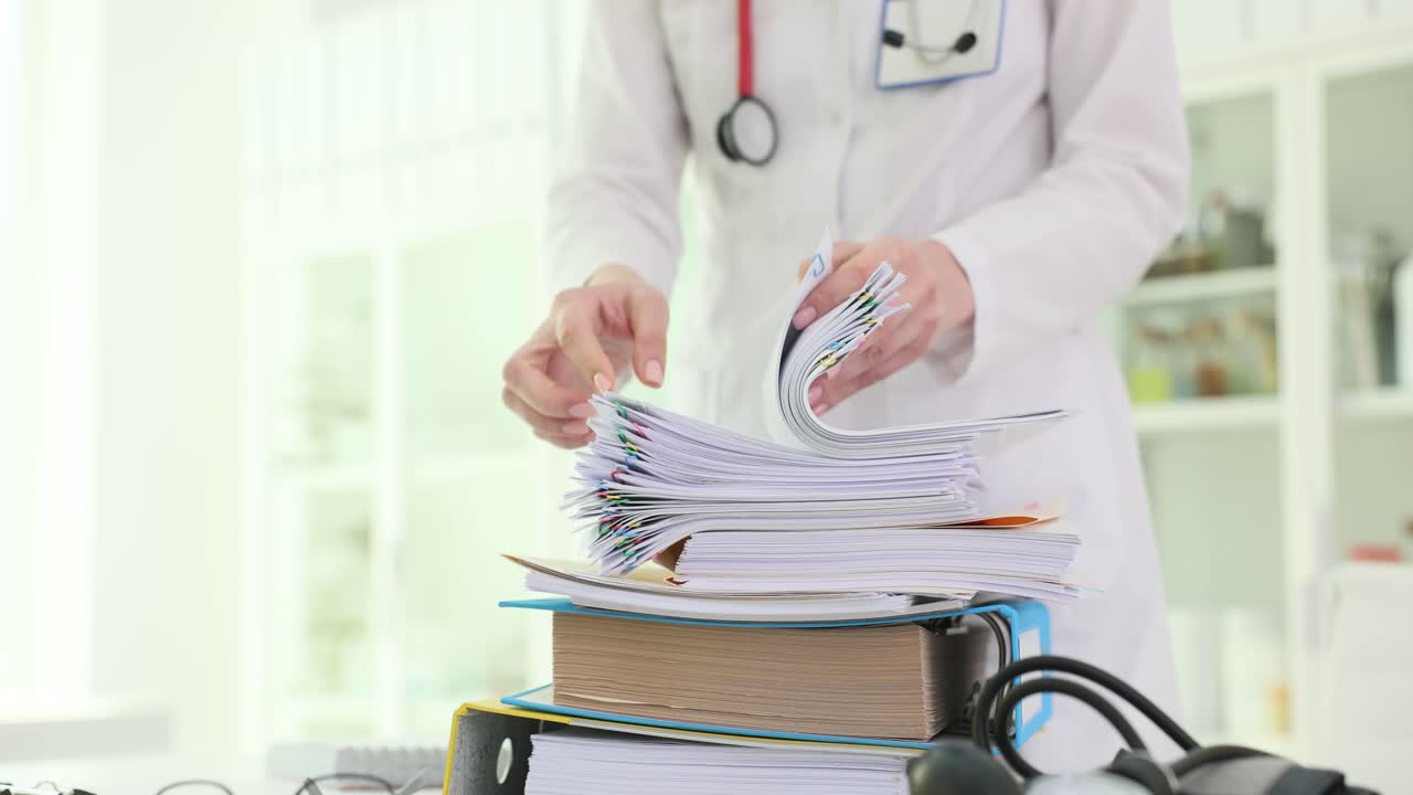 Doctor examining medical records
