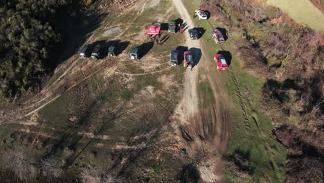 gathering of rally cars before the start line of the race