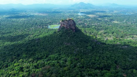 aerial drone landscape of sigiriya tourism site unesco heritage listed mountain rock formation in tropical rainforest climate sri lanka travel asia