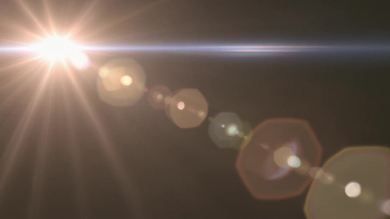 Effetto flare lente luminoso su sfondo scuro