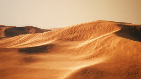 beautiful sunset over sand dunes of sahara desert in morocco