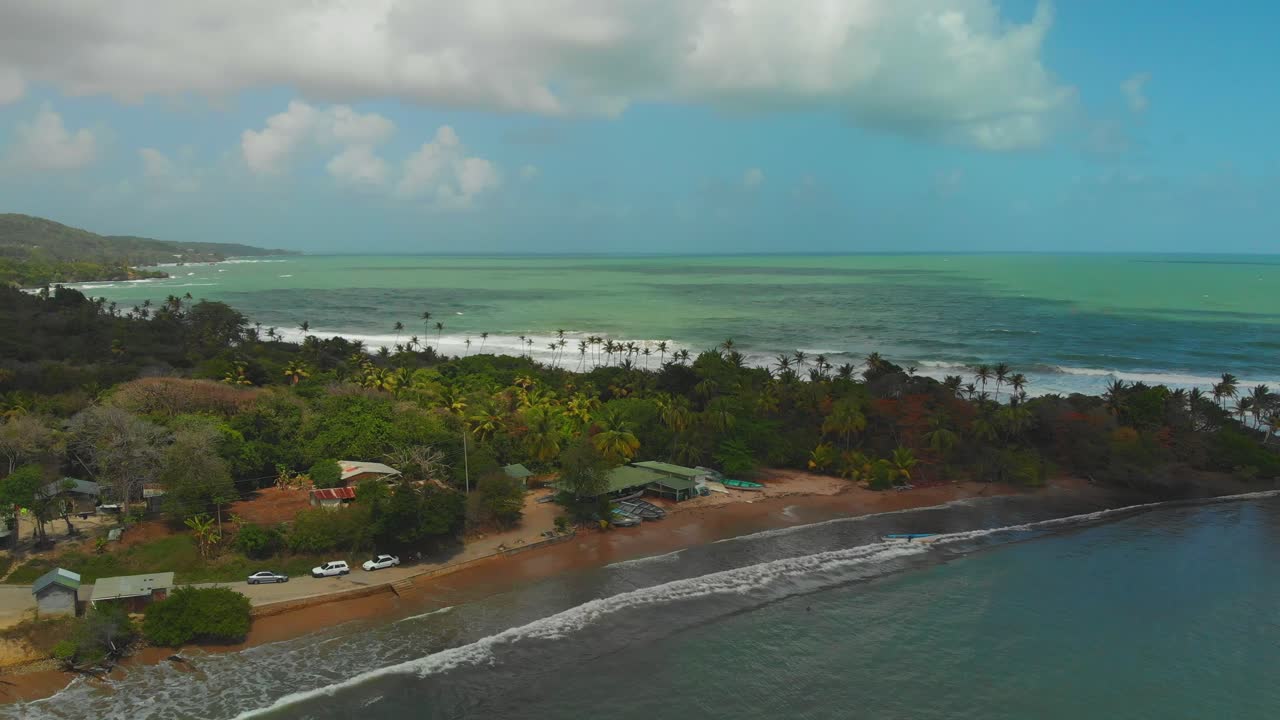 Epic aerial of Balandra Bay fishing village located on the north coast of Trinidad