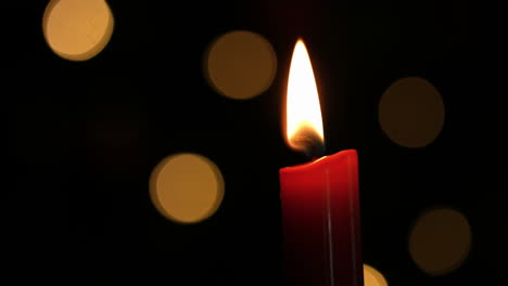 candle burning at christmas time