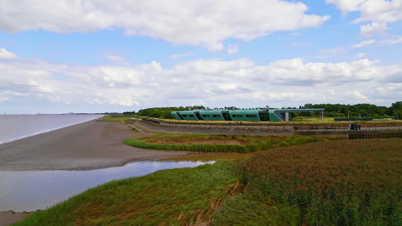 Witness the Waters' Edge Country Park and Visitor Centre against the striking silhouette of the Humber Bridge in this aerial video