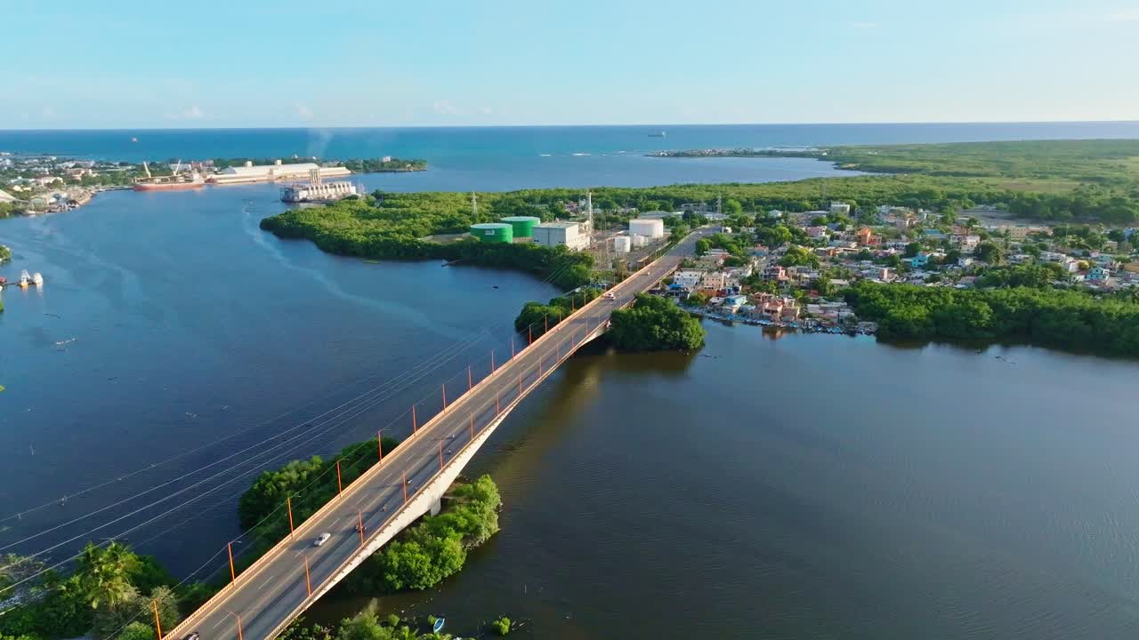 Scenic panorama aerial orbit bridge Puente Sobre el Rio in San Pedro de Macor&iacute;s
