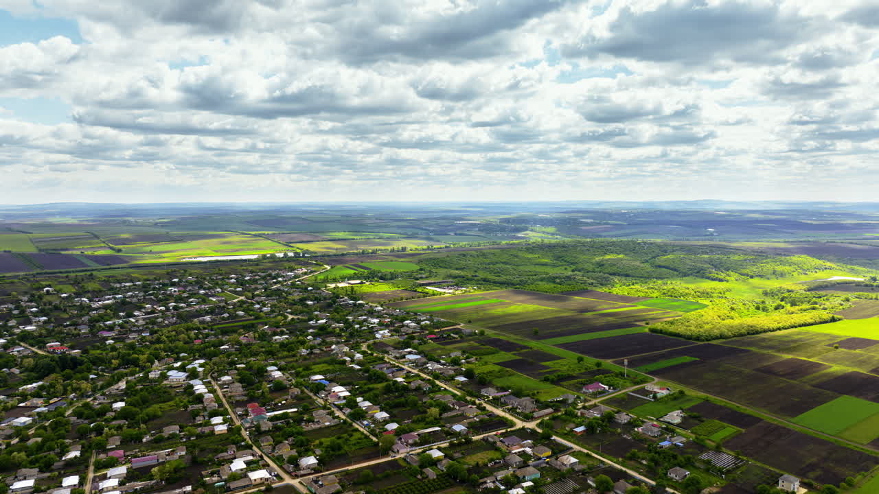 Aerial drone view of Pelinia, Drochia, Moldova with a cloudy sky