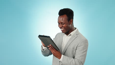 happy black man, tablet and fist pump