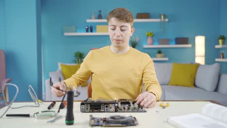 Teenager trying to solve electronics.
