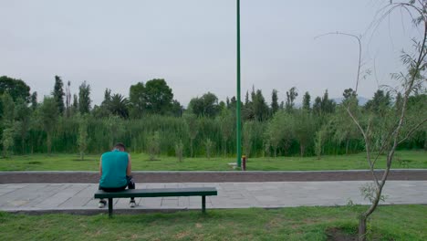 View-of-a-trail-and-a-runner-resting,-in-Xochimilco,-Mexico-City