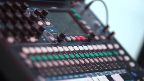professional sound mixer - music pad at an edm concert in slow motion.