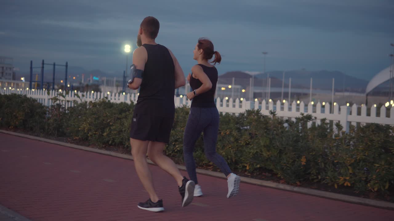Couple Running at Night