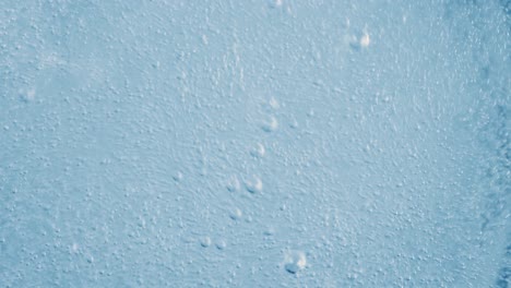 oxygen bubbles in water on a blue abstract background