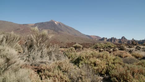 Volcanic-landscape-around-Mount-Pico-del-Teide-and-Los-Roques-de-Garcia,-Teide-National-Park-in-Tenerife,-Canary-Islands-in-spring