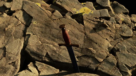 Excalibur-sword-in-rocky-stone-at-sunset