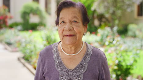 Senior-woman,-retirement-portrait-and-garden