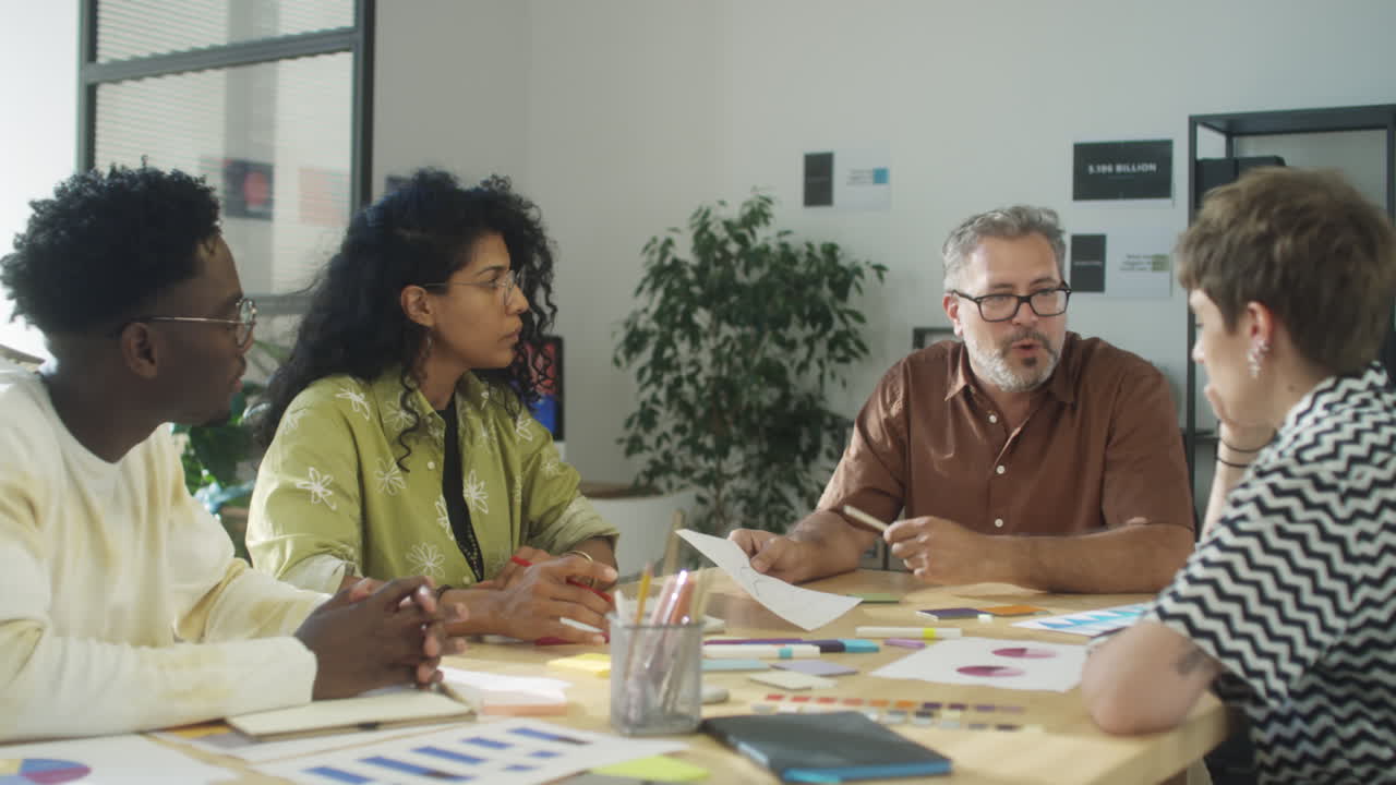 Multiethnic Team Discussing Creative Project