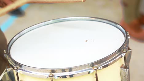 drummer hitting drum slow motion