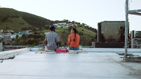 couple, city rooftop and relax together with love