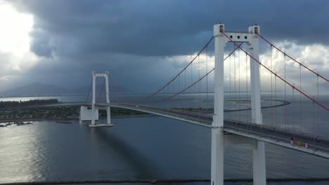 Aerial-of-Thuan-Phuoc-suspension-bridge-with-traffic-over-river-in-Danang,-Vietnam