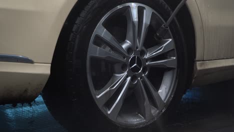 reviving radiance: pressure washing a grimy wheel to sparkling clean