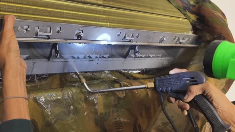 cleaning an air conditioner unit
