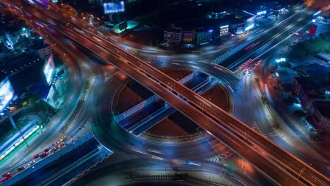 time lapse,hyper lapse ,of traffic on city streets at night. aerial view and top view of traffic on freeway, 4k.