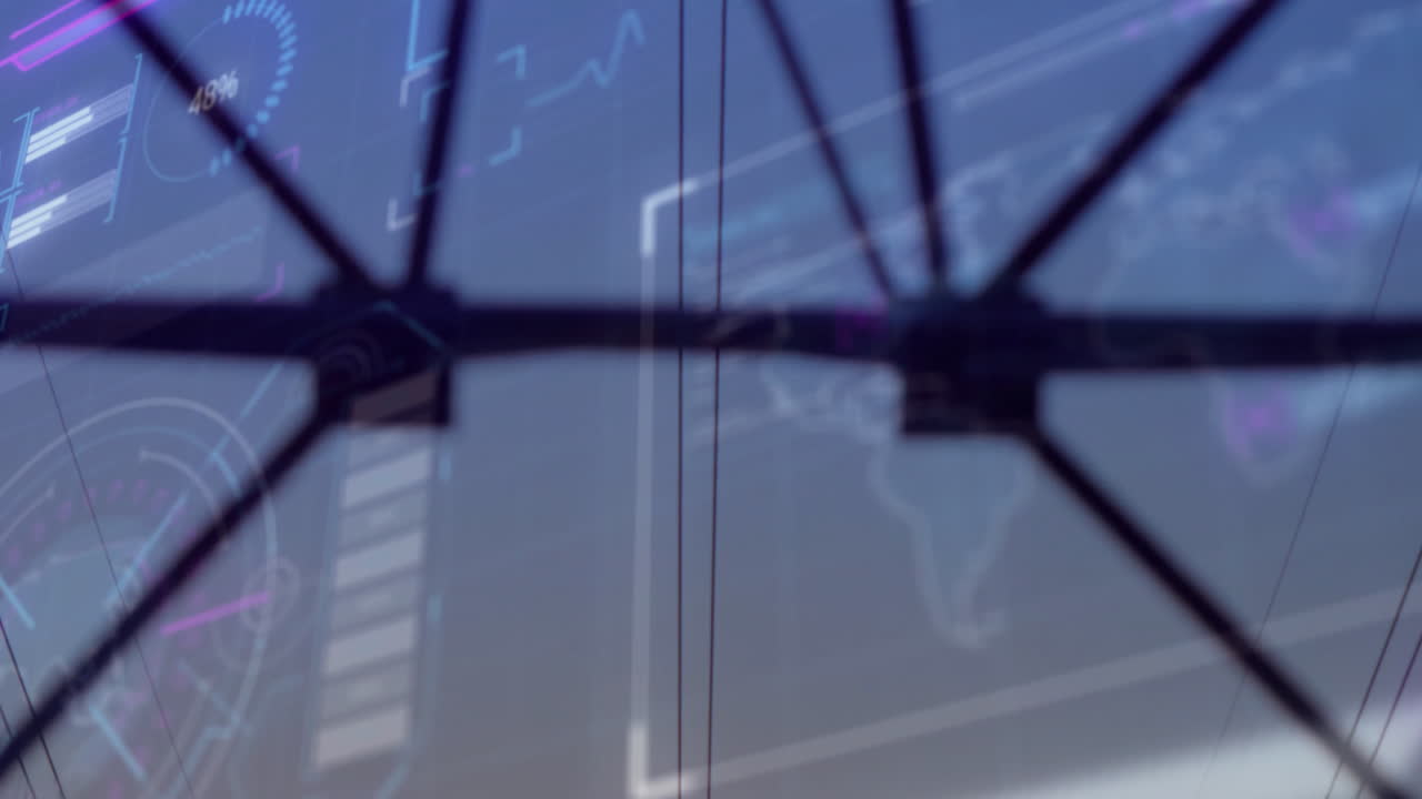 Animation of digital data overlay with abstract geometric shapes on blue background