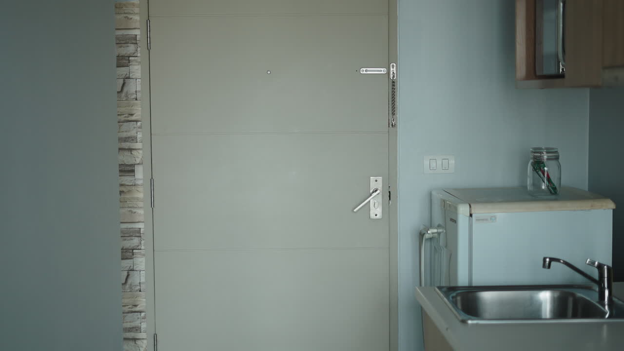 Man with shopping bag in apartment