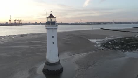 Hora-Dorada-Vista-Aérea-órbita-A-Través-De-La-Costa-Faro-Puerto-De-Envío-Grúas-Amanecer-Horizonte