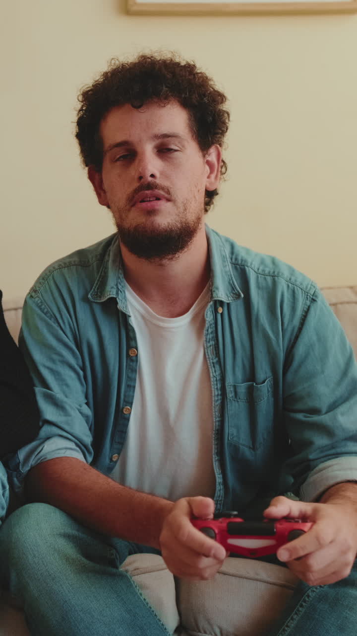 Man playing video game with a controller