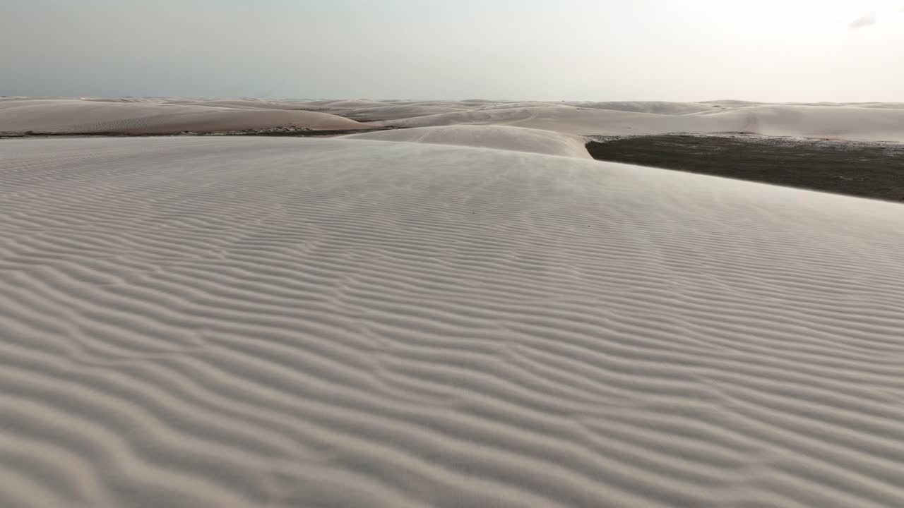 Flying Above Desert Sand Dunes Of Lencois Maranhenses National Park In Maranhao, Brazil. drone shot