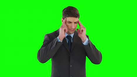 businessman getting a headache