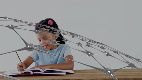 young girl writing in notebook with network connections animation overlay
