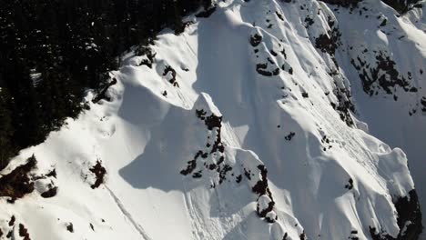 spectacular scene of snow covered cliffs in winter, taken at garibaldi lake, near squamish and whistler, north of vancouver, bc, canada