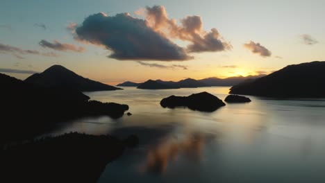 aerial view of stunning peninsula landscape in elaine bay with still, calm water in the remote wilderness of pelorus sound te hoiere of marlborough sounds, south island of new zealand aotearoa