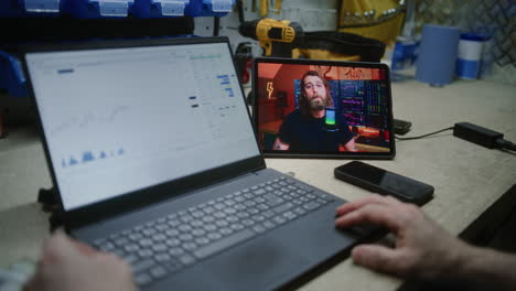 man checking real-time stocks, exchange market charts using laptop computer. employee making cryptocurrency investments during working hours in workshop, combining job with online trading. close up.