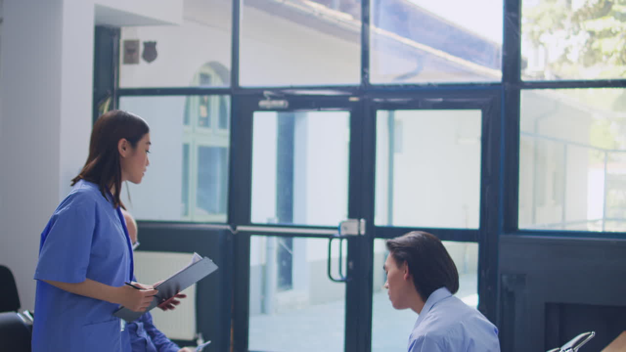 Healthcare professionals in a hospital waiting room