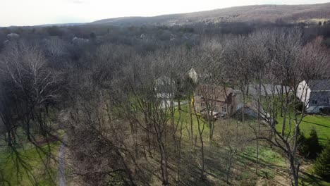 Aerial-forest-view-in-springtime-with-good-weather-in-Chesterbrook,-Pennsylvania