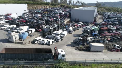 Aerial-view-of-a-junkyard-and-large-group-of-wrecked-cars