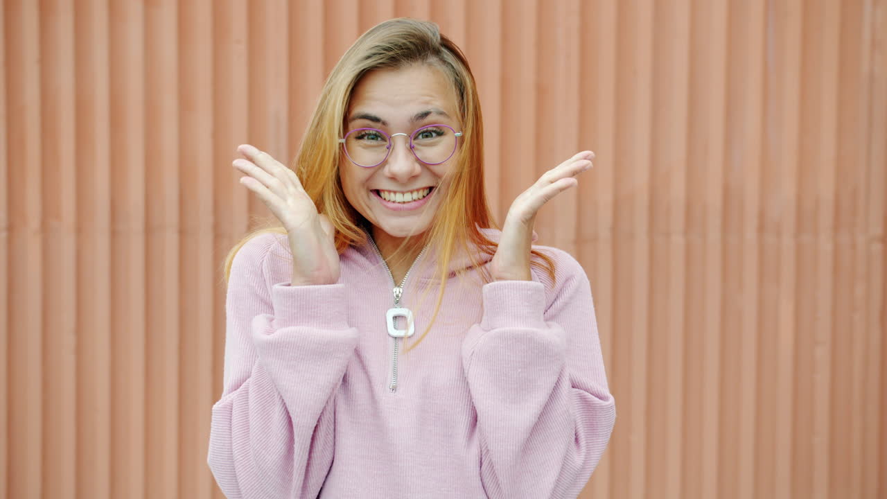 Happy Woman in Pink Hoodie