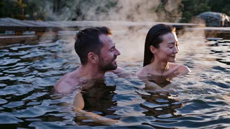 couple relaxing in a hot spring