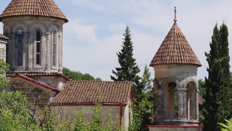 motsameta monastery church towers and steeples with red tile roofs