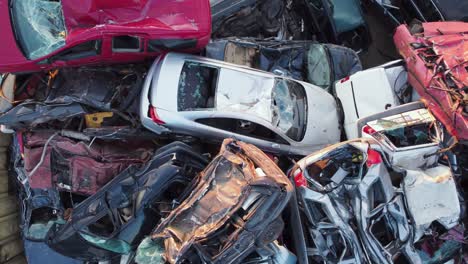 Pile-of-demolished-cars-at-a-scrapyard