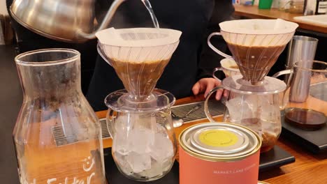 barista making drip coffee with precision and care