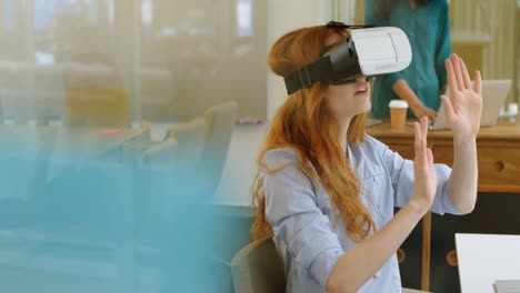 Female-executive-using-virtual-reality-headset-4k