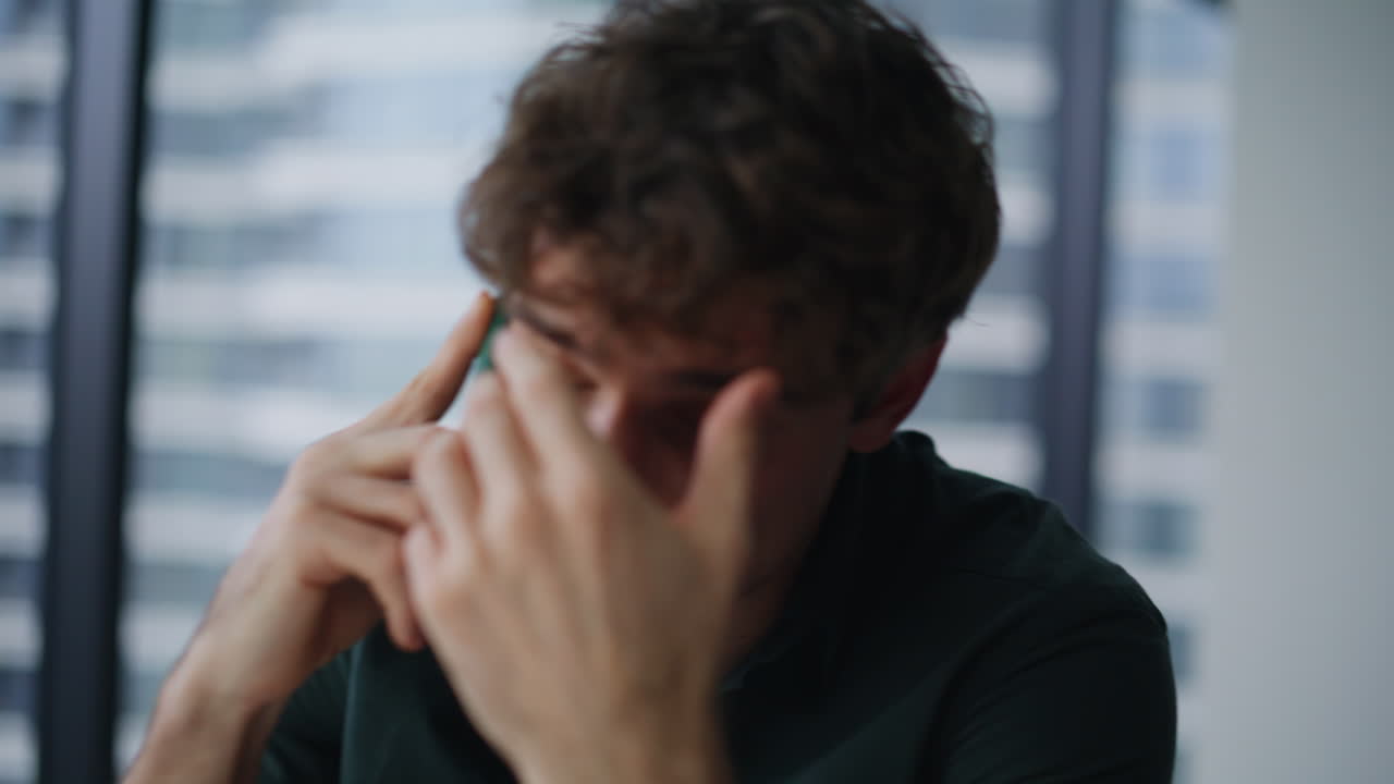 Entrepreneur discussing contract cellphone call at corporate workplace closeup