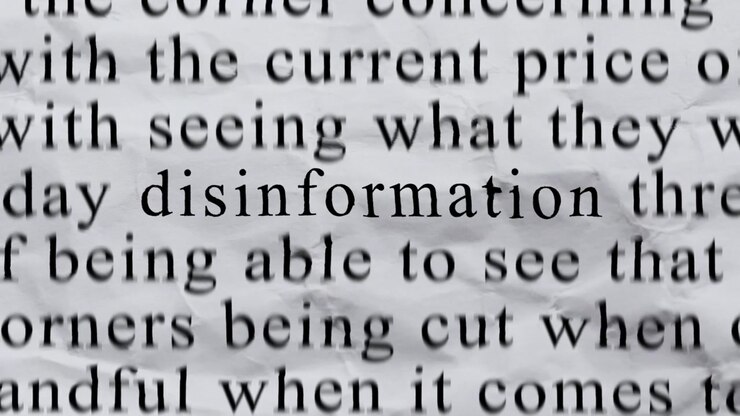 DISINFORMATION Text in Centre with High-energy Fast Text Stop-Motion Writing Cycling Rapidly on Crinkled Texture Paper. Newspaper Cuttings Style animation. 4K.